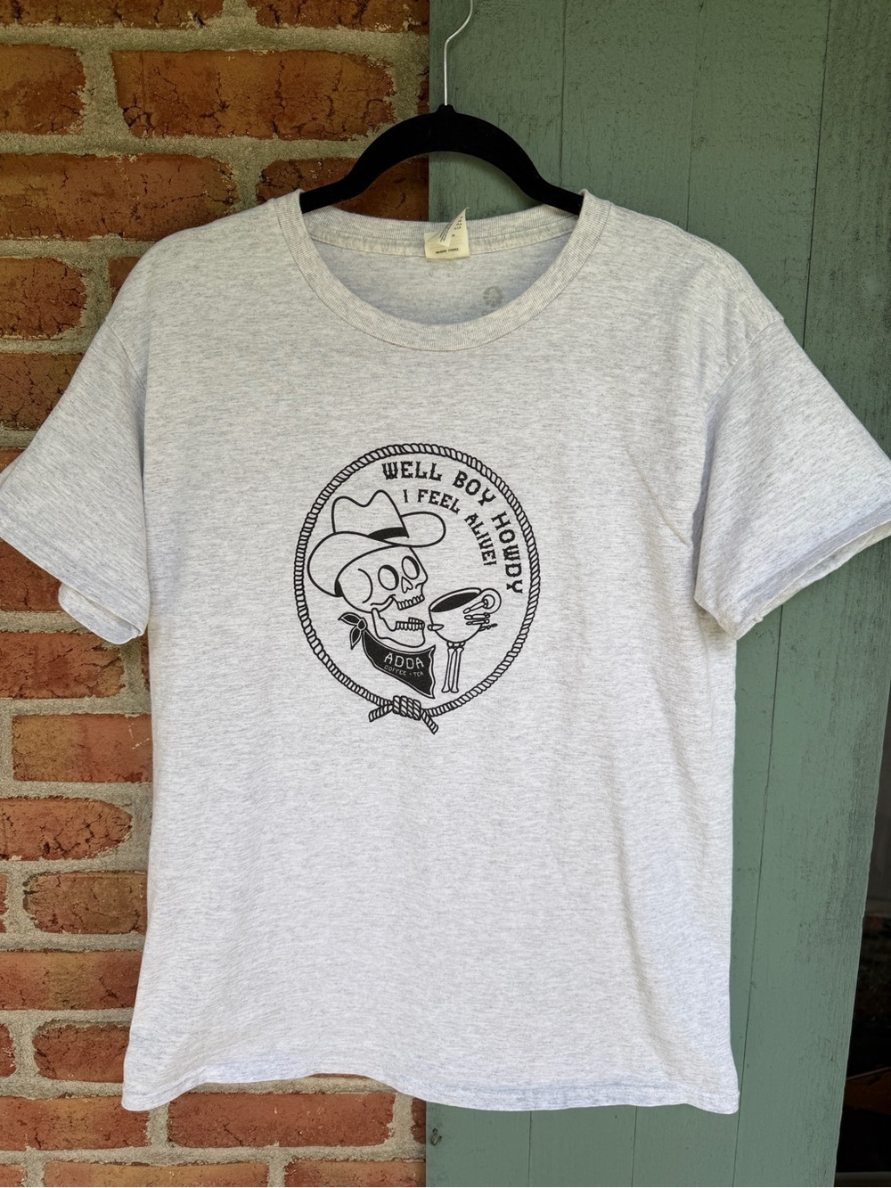 Light Gray Graphic Tee with Black Skull Cowboy Coffee Print
